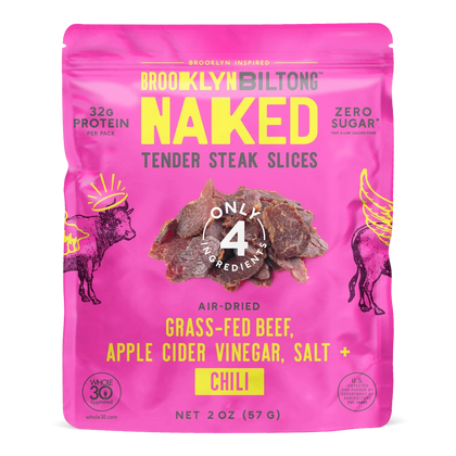 Brooklyn Biltong Naked Chili tender steak slices front, pink bag showing air-dried grass-fed beef slices and Whole30 badge