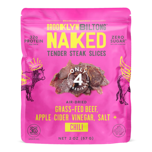 Brooklyn Biltong Naked Chili tender steak slices front, pink bag showing air-dried grass-fed beef slices and Whole30 badge