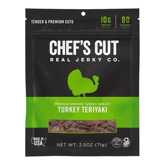 Chef's Cut Real Jerky Co. Turkey Teriyaki jerky bag, front, window showing small dark pieces of smoked turkey jerky