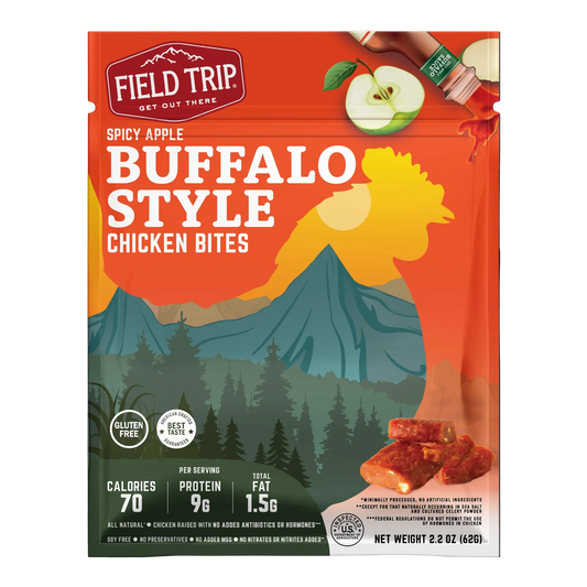 Field Trip Spicy Apple Buffalo Style Chicken Bites bag front with mountain art, green apple, hot sauce bottle and bites photo