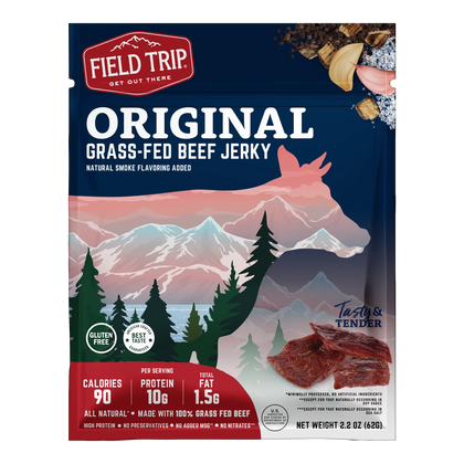 Front of Field Trip Original Grass-Fed Beef Jerky bag with mountain and cow artwork, gluten free badge and jerky pieces