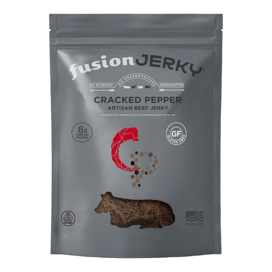 Fusion Jerky Cracked Pepper Artisan Beef Jerky front of gray bag with peppercorn graphic, 8g protein and gluten free badges