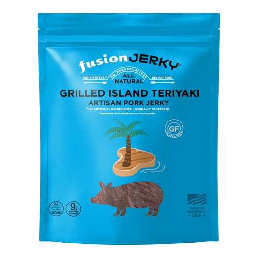Fusion Jerky Grilled Island Teriyaki Artisan Pork Jerky front: blue bag, palm tree island art, pig silhouette
