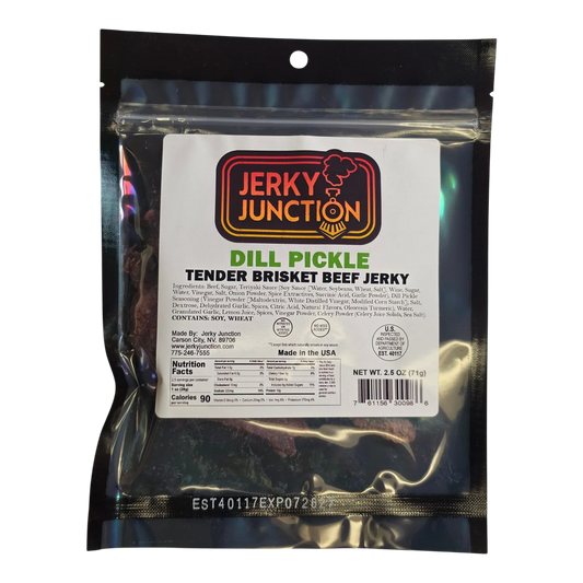 Jerky Junction Dill Pickle Tender Brisket Beef Jerky front, black bag, clear window showing dark reddish-brown brisket pieces