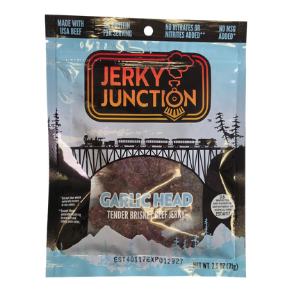 Jerky Junction Garlic Head brisket beef jerky front, blue bag with train art and window showing dark reddish-brown pieces