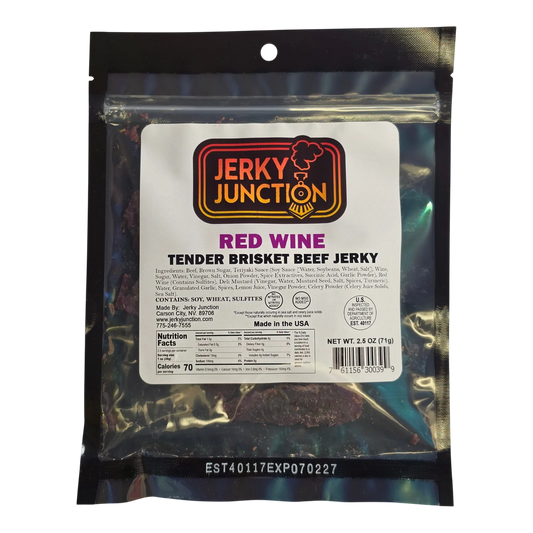 Jerky Junction Red Wine Tender Brisket Beef Jerky front, black bag with clear window showing dark red-brown brisket pieces

