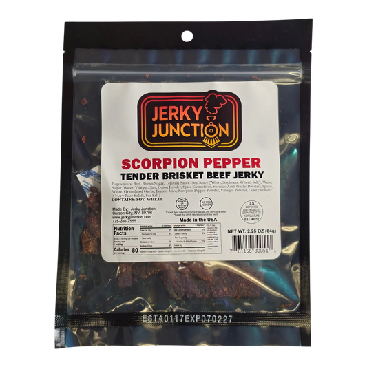 Jerky Junction Scorpion Pepper Tender Brisket Beef Jerky front, black bag with window showing dark reddish-brown strips