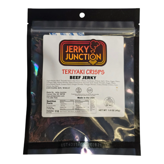 Jerky Junction Teriyaki Crisps beef jerky front, clear bag with white label and dark reddish-brown beef crisps visible