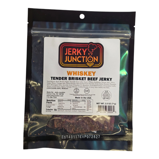 Jerky Junction Whiskey Tender Brisket Beef Jerky front, black bag with window showing dark reddish-brown jerky pieces