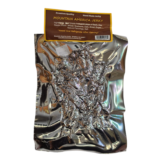 Mountain America Jerky Garlic Pepper Beef Jerky back: silver bag, brown label with ingredients