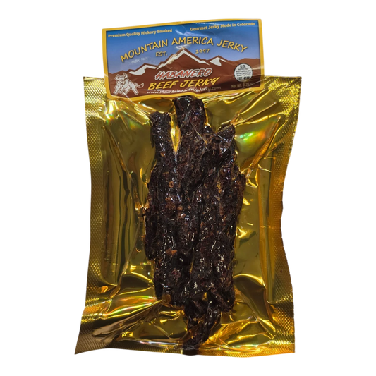 Mountain America Jerky Habanero Beef Jerky front, gold bag with clear window showing dark strips of hickory smoked beef jerky