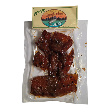 Mountain America Jerky Peppered Salmon Jerky front: Pepper Smoked Salmon label on a clear pouch of glossy peppered salmon