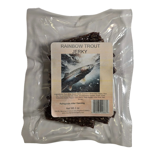 Mountain America Jerky Rainbow Trout Jerky front: clear vacuum-sealed pack, dark jerky strips visible behind the trout label