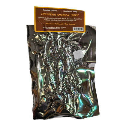 Mountain America Jerky Sweet & Spicy Beef Jerky back label with ingredients, Brighton CO address and reseal note