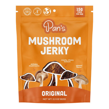 Pan's Mushroom Jerky Original front of bag, orange pouch printed with shiitake mushrooms and jerky pieces, no window