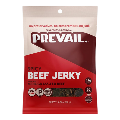 PREVAIL Jerky Spicy Beef Jerky front, red and cream bag with window showing dark jerky pieces, made with 100% grass-fed beef