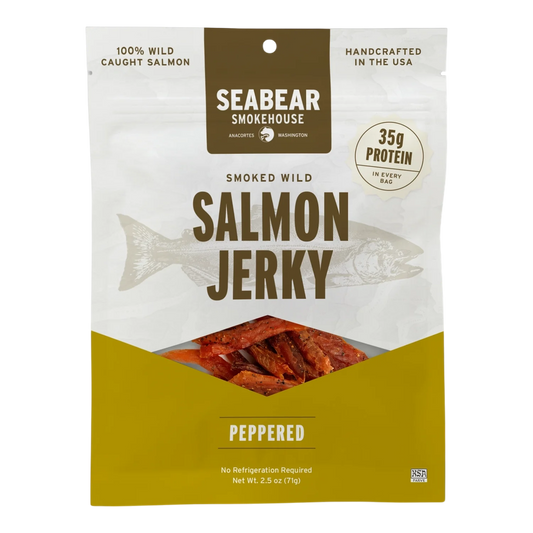 SeaBear Smokehouse Peppered Wild King Salmon Jerky bag front, window showing salmon strips flecked with black pepper