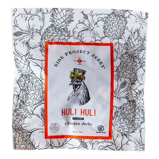 Side Project Jerky Huli Huli Chicken Jerky front of bag, rooster in a floral top hat on hibiscus and pineapple line art