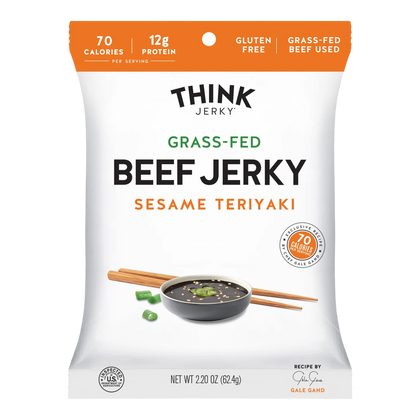 Think Jerky Sesame Teriyaki grass-fed beef jerky bag front, orange band, bowl of dark sauce with sesame seeds and scallions