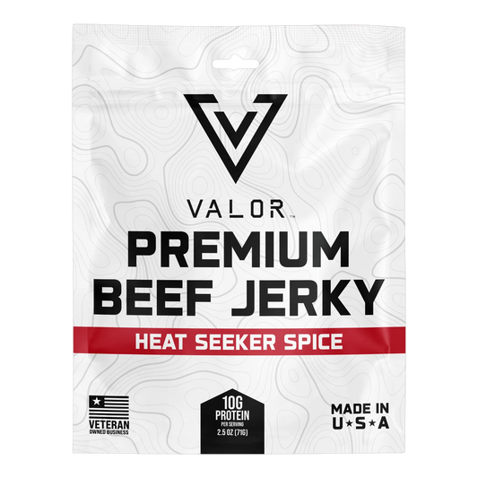 Valor Meat Snacks Heat Seeker Spice beef jerky bag front with red flavor band, veteran owned badge and Made in USA mark