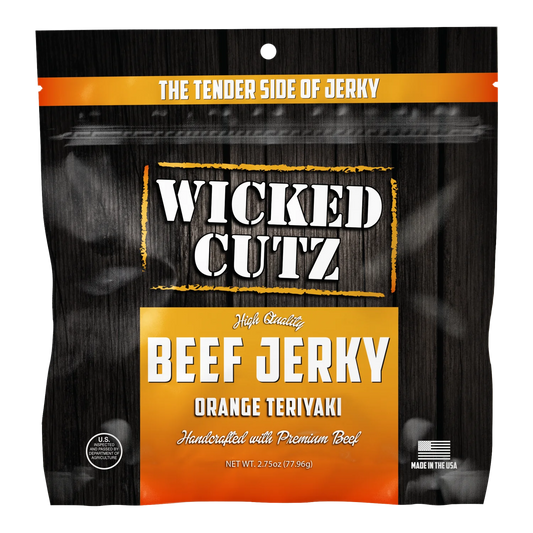 Wicked Cutz Orange Teriyaki Beef Jerky front of package, black bag with orange panel, Made in the USA and USDA badges
